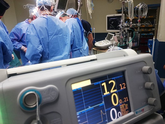 surgeons performing surgery