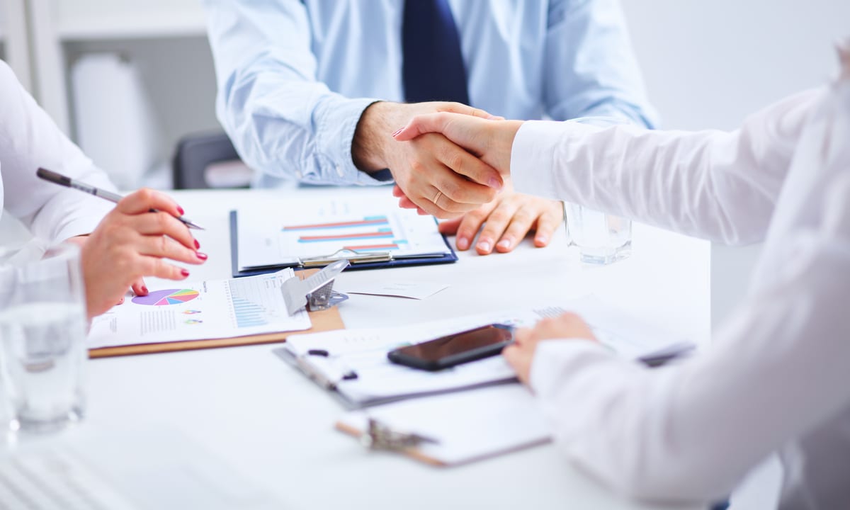two business people shaking hands
